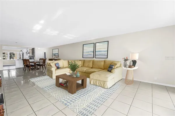 a living room with furniture and a table