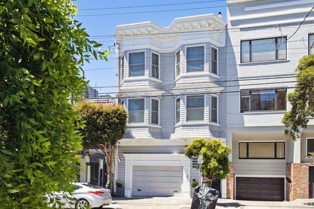 a front view of a multi story residential apartment building