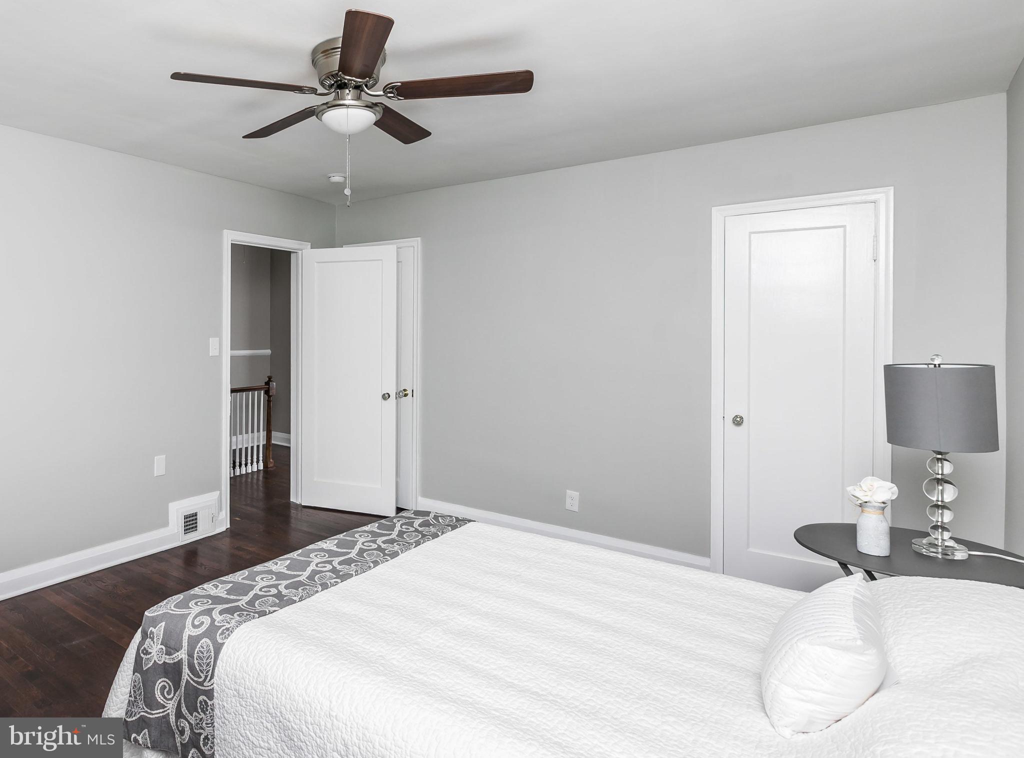 1816 Aberdeen Road Towson, MD 21286 - Photo 14 of 30 a bedroom with a bed and a chandelier
