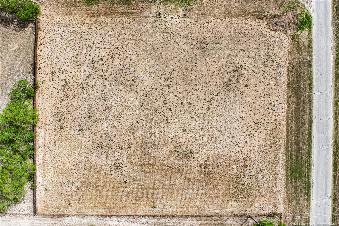 207 Rancho Seco Riviera, TX 78379 - Photo 11 of 11 a bathroom with a shower curtain