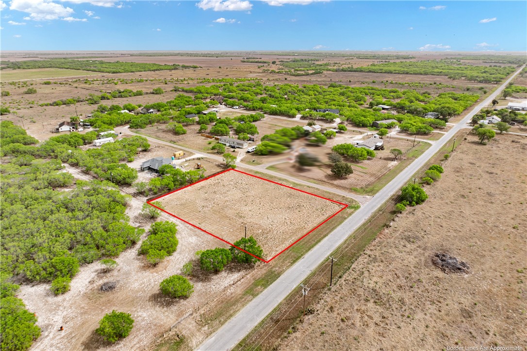 207 Rancho Seco Riviera, TX 78379 - Photo 7 of 11 an aerial view of residential houses with outdoor space