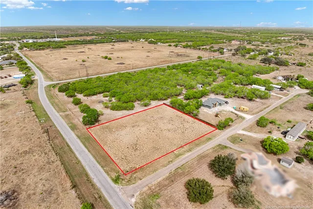 an aerial view of beach and ocean