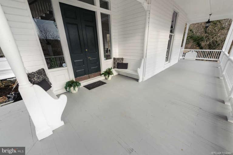 2304 Hillhouse Road Baltimore, MD 21207 - Photo 2 of 30 Sprawling wrap-around front porch