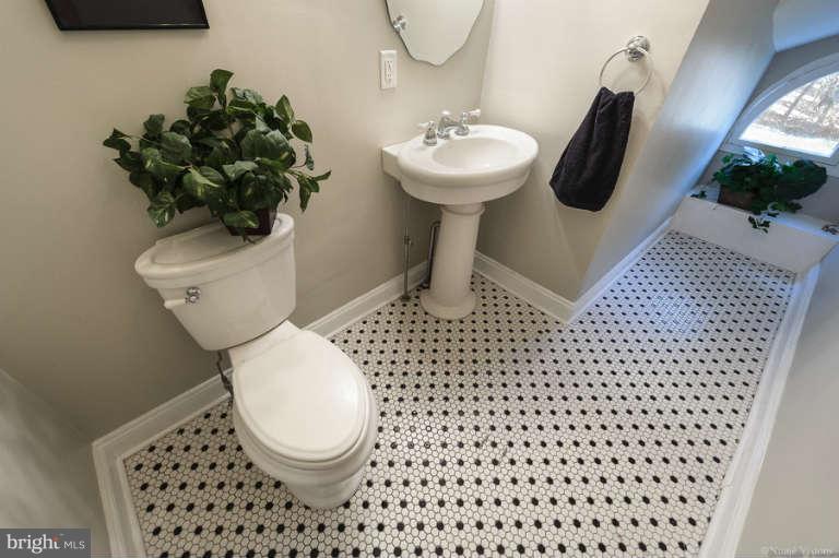 2304 Hillhouse Road Baltimore, MD 21207 - Photo 14 of 30 Half bath on main level