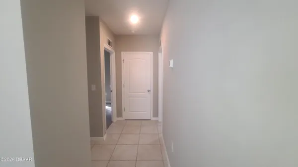 a view of hallway with shower