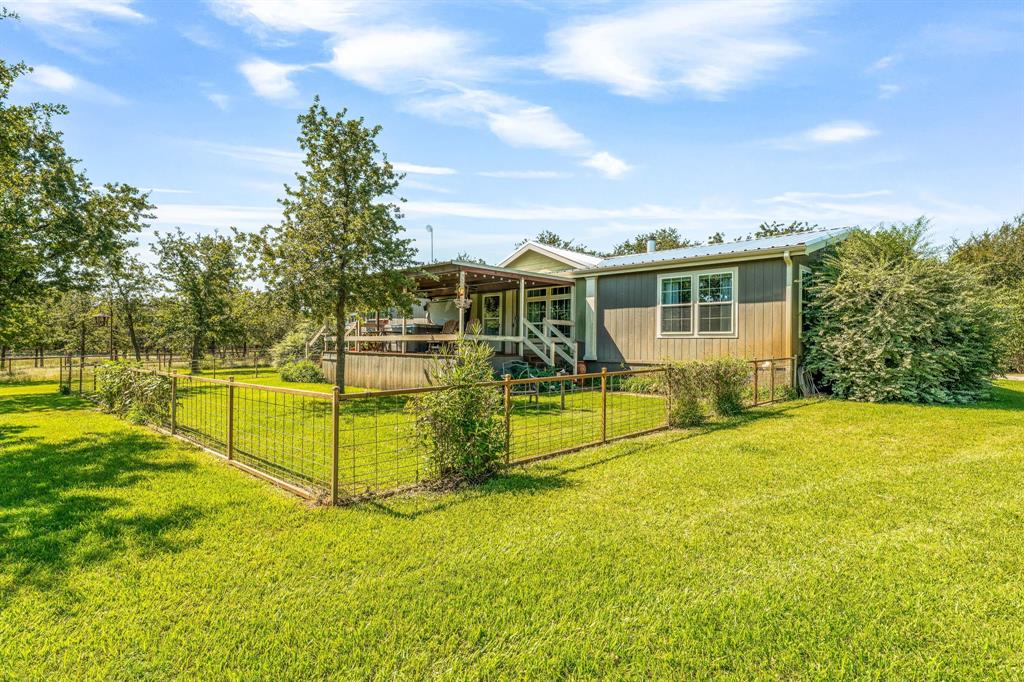 1071 Grimes Road Mineral Wells, TX 76067 - Photo 13 of 25 a view of a house with swimming pool