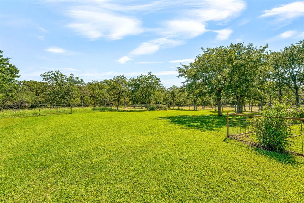 1071 Grimes Road Mineral Wells, TX 76067 - Photo 14 of 25 a view of a park with large trees
