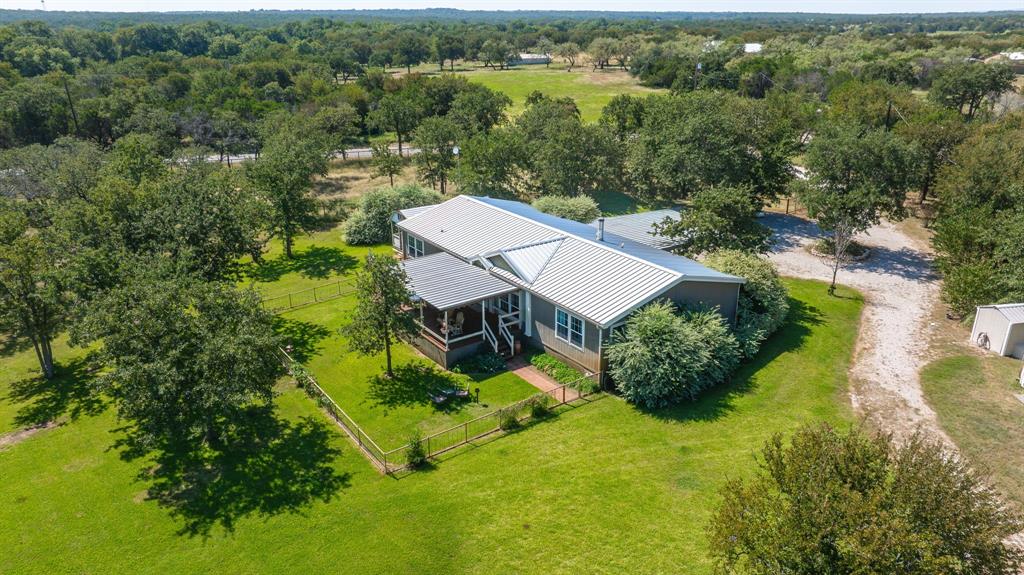 1071 Grimes Road Mineral Wells, TX 76067 - Photo 18 of 25 an aerial view of a house with swimming pool and garden
