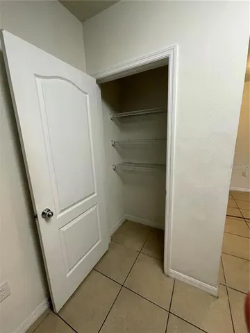a view of an empty walk in closet