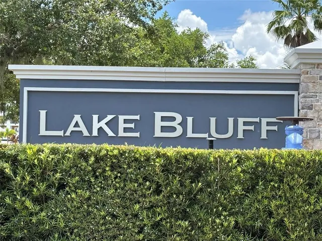 a view of a yard front of house