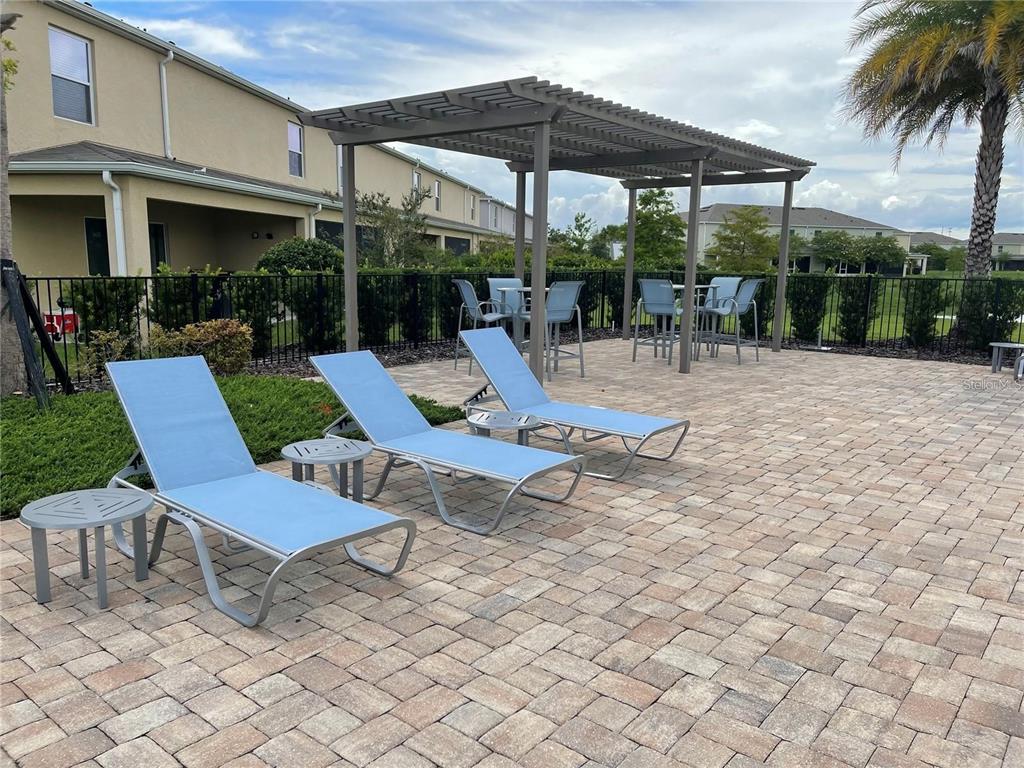 268 Arbor Lakes Drive Davenport, FL 33896 - Photo 23 of 26 a view of outdoor space yard deck patio and swimming pool