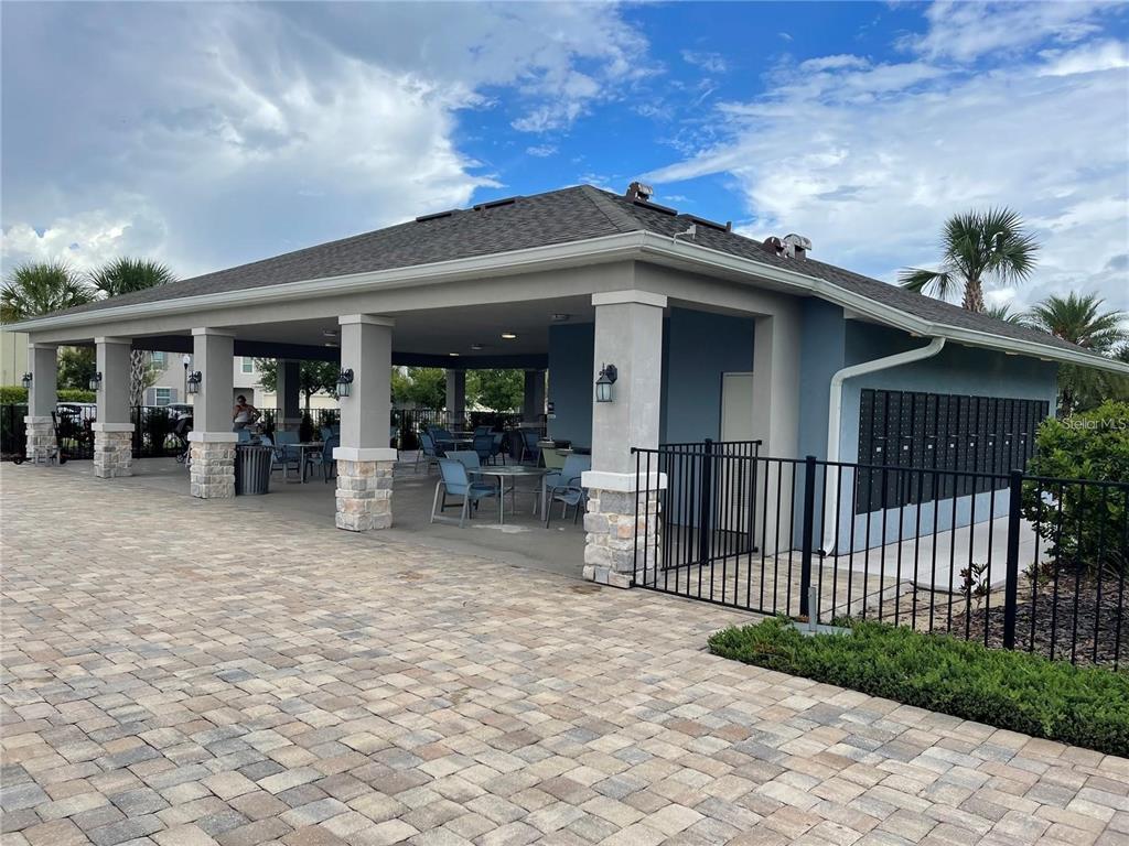 268 Arbor Lakes Drive Davenport, FL 33896 - Photo 25 of 26 a view of a house with a porch