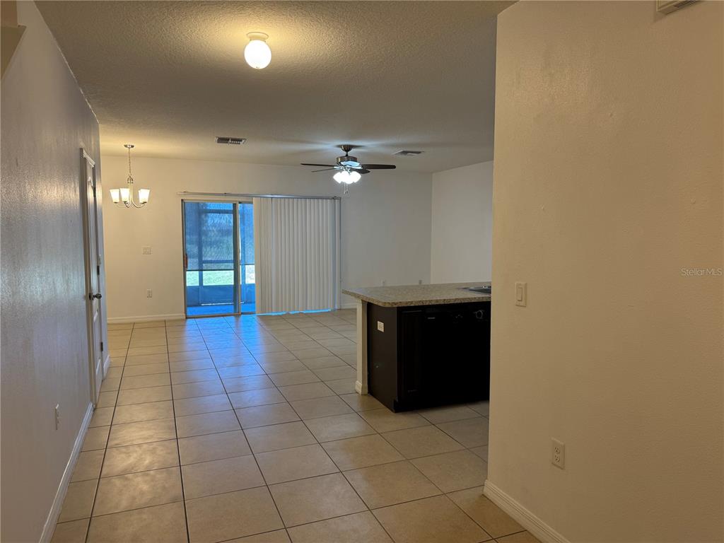 268 Arbor Lakes Drive Davenport, FL 33896 - Photo 4 of 26 a view of an empty room with a bathroom