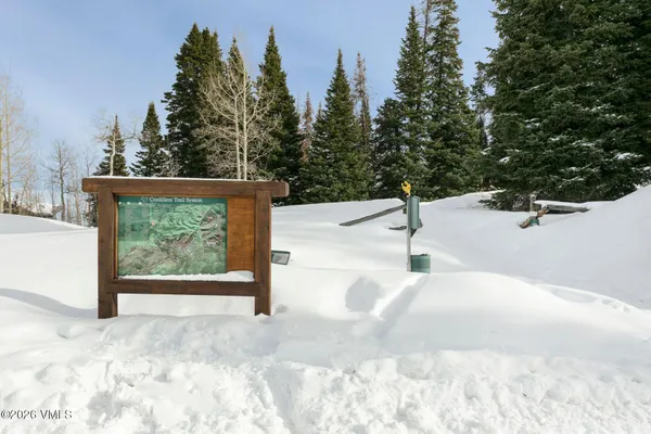 a view of a road with a building in the background
