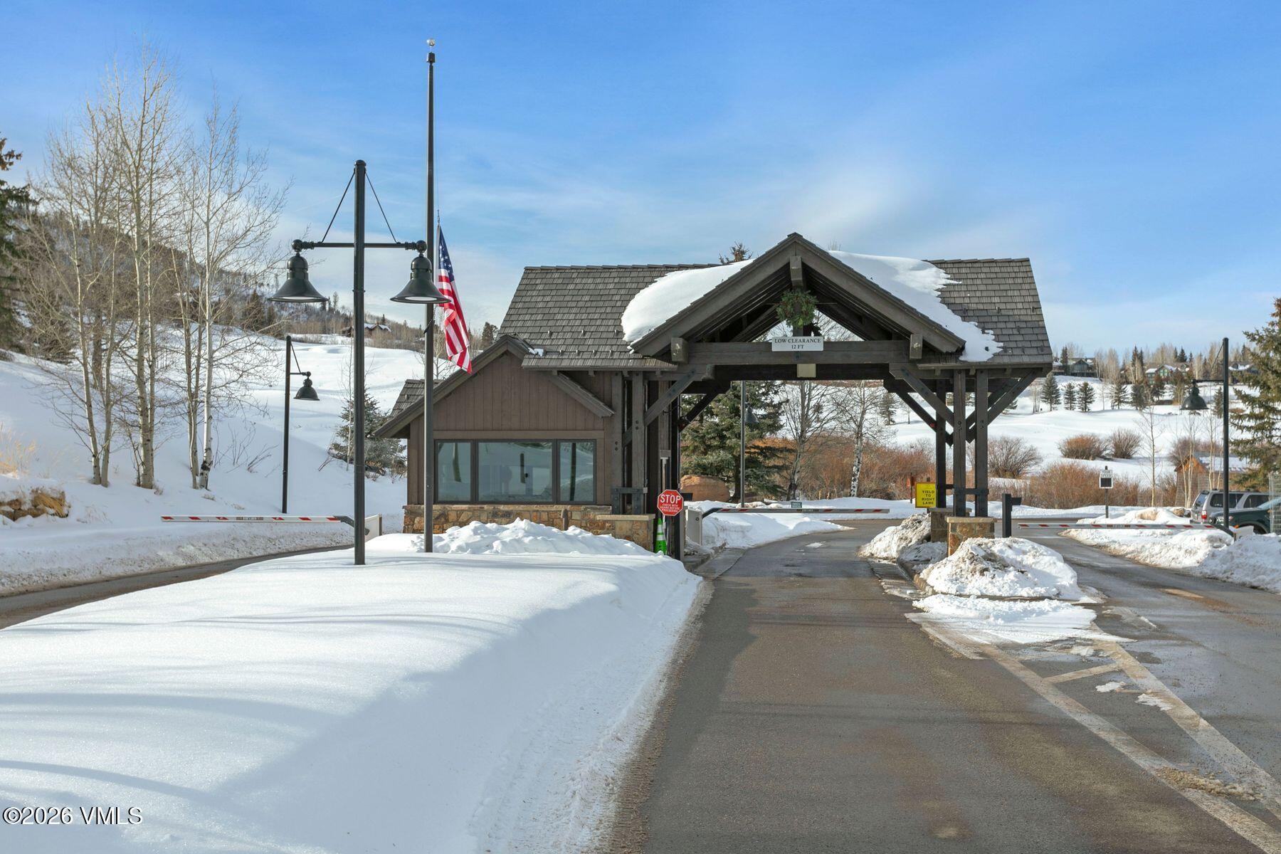 1279 Gore Trail Edwards, CO 81632 - Photo 10 of 18 a front view of a house with a garden