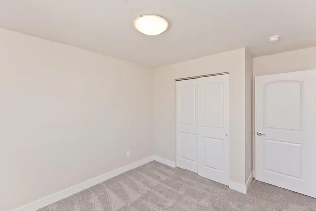 an empty room with a workbench