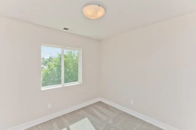 an empty room with window