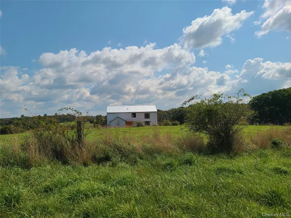 a view of a lake and green space