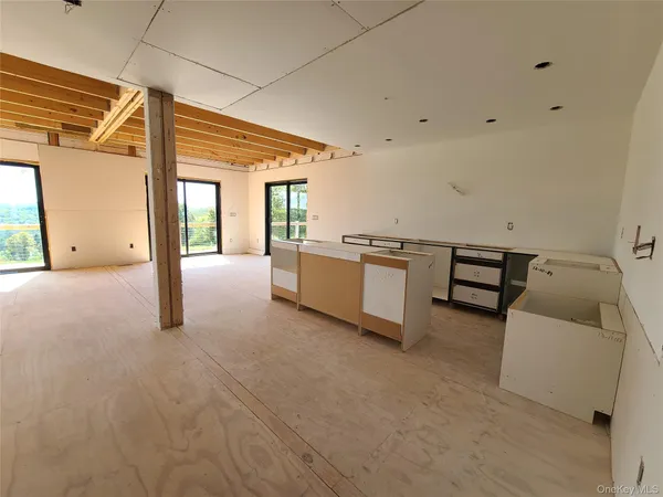 a view of a golf course with a lake