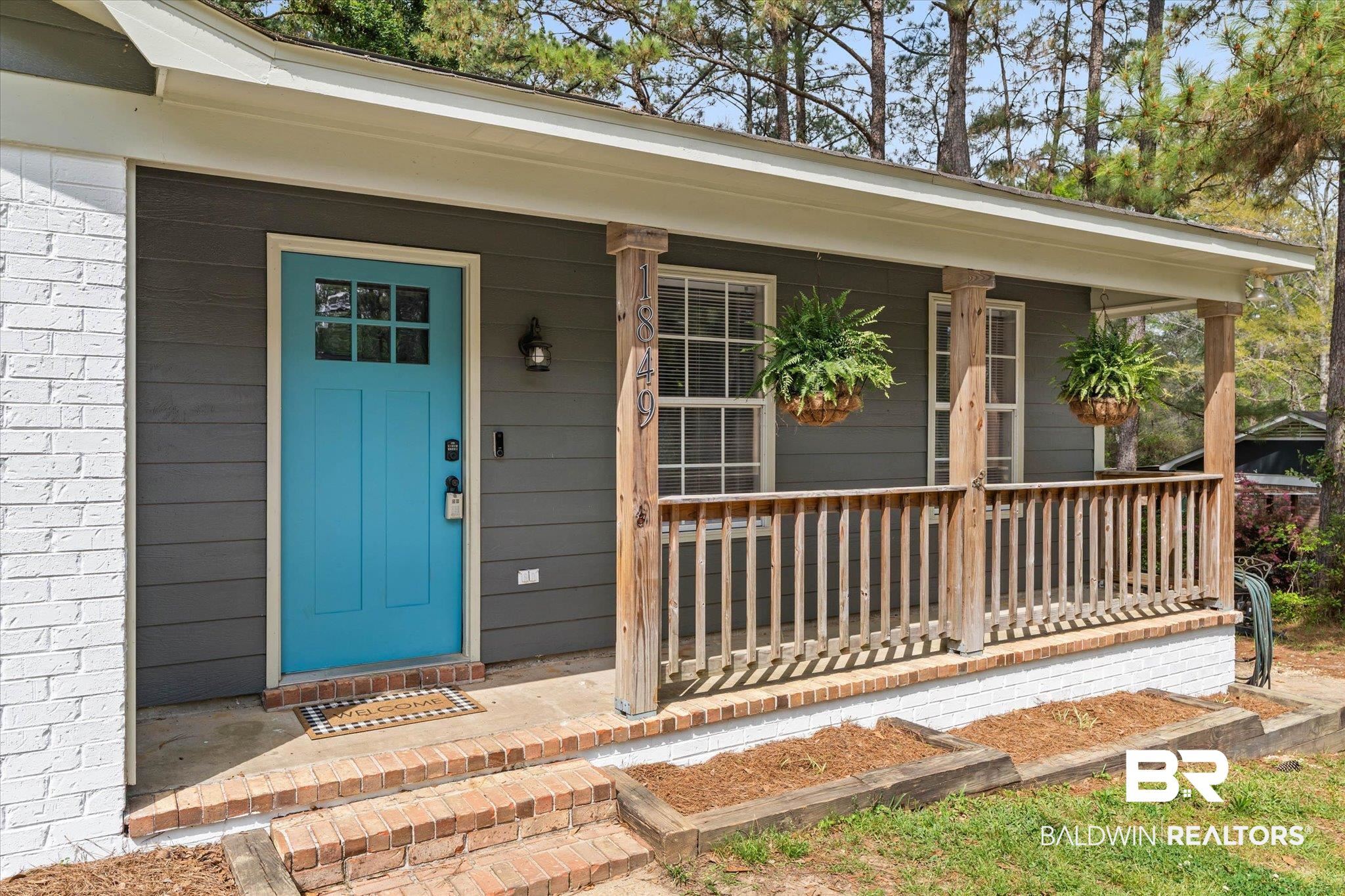 1849 Ranch House Drive Semmes, AL 36575 - Photo 2 of 23 Entrance to property with a porch