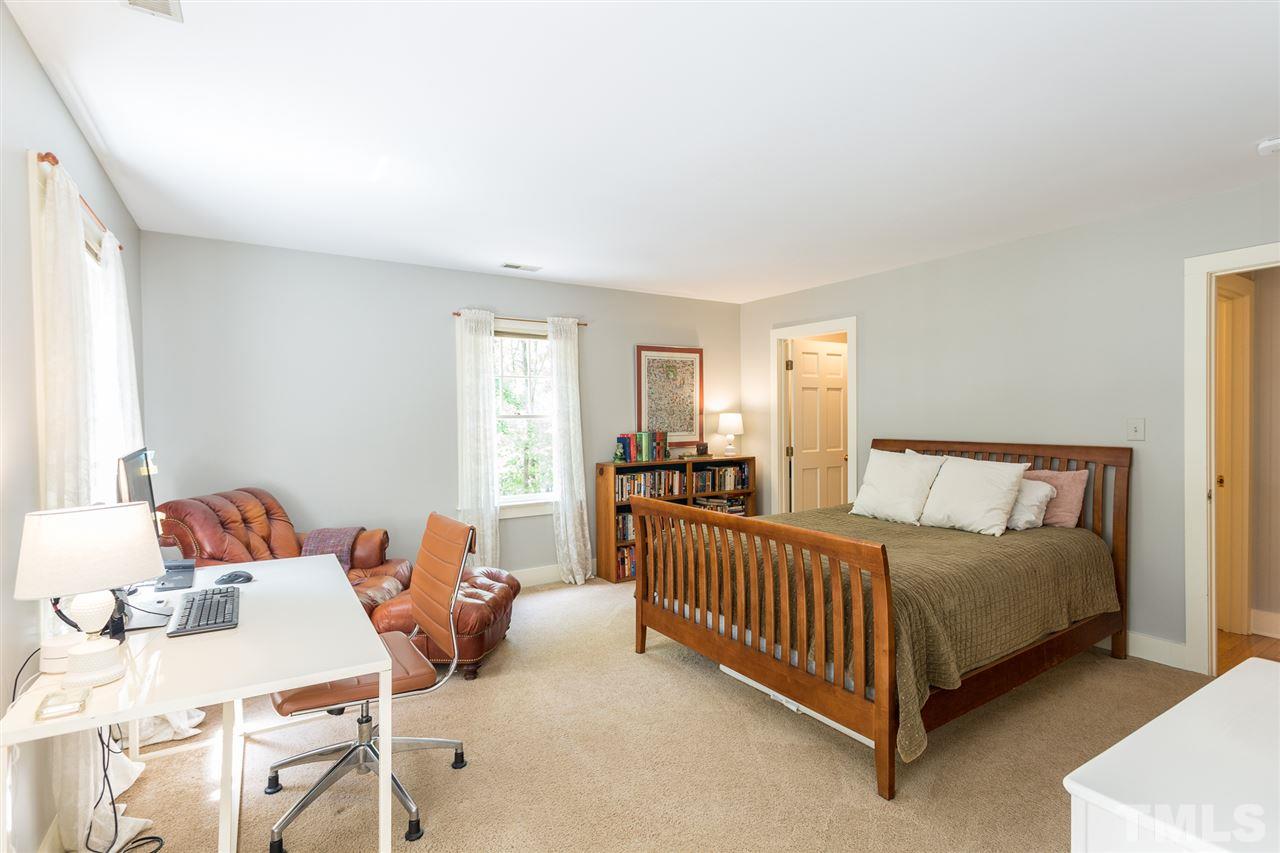 11809 Appaloosa Run East Raleigh, NC 27613 - Photo 23 of 30 Your guests will rest well in this lovely and generous second floor bedroom. Room features carpeting, smooth ceilings, and a large walk-in closet. The hall bathroom is located nearby for your convenience.