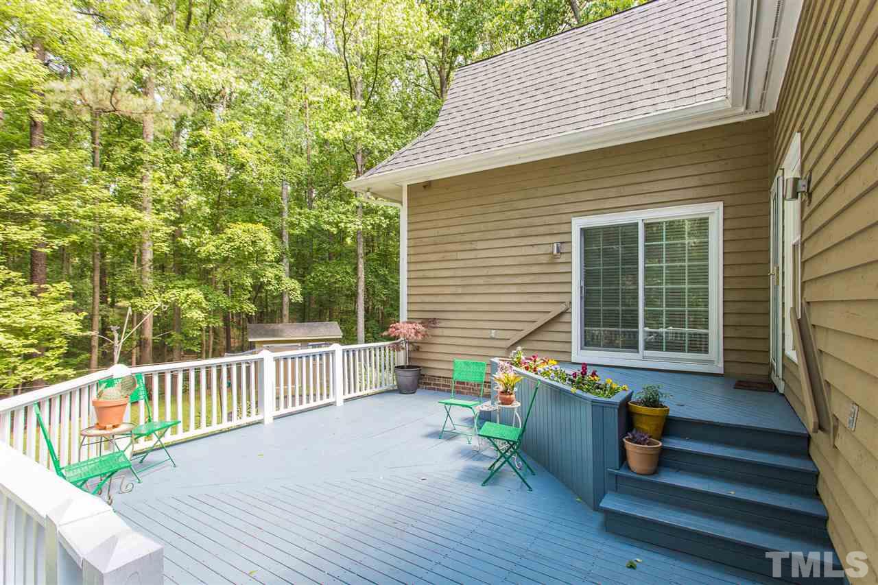 11809 Appaloosa Run East Raleigh, NC 27613 - Photo 29 of 30 You will enjoy grilling out on this lovely deck during those fun summer afternoons and evenings. Sliding glass doors lead from the master bedroom on to the deck.