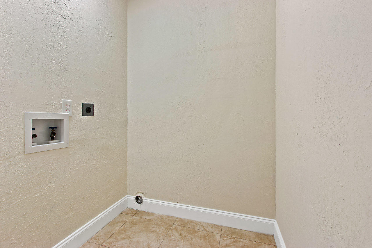 5903 Southeast Mitzi Lane Stuart, FL 34997 - Photo 18 of 22 a view of an empty room