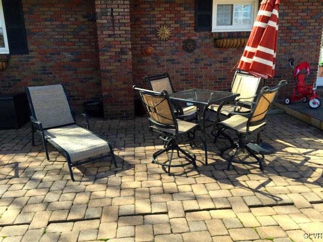 810 Allegheny Road Mount Bethel, PA 18343 - Photo 19 of 26 Stone pavered dining area to left of rear entrance