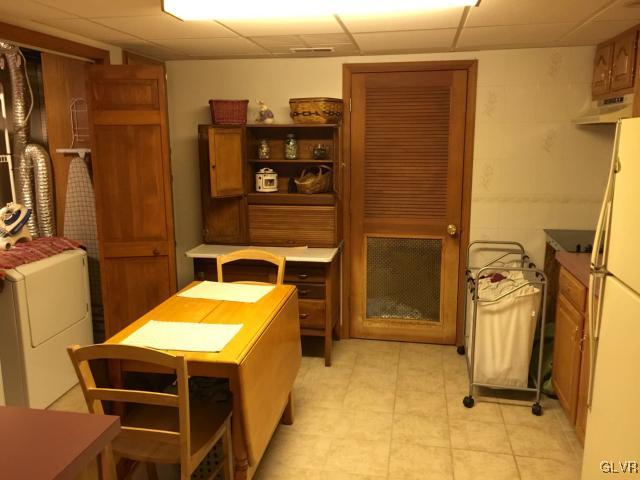 810 Allegheny Road Mount Bethel, PA 18343 - Photo 24 of 26 Kitchen and laundry area in lower level.