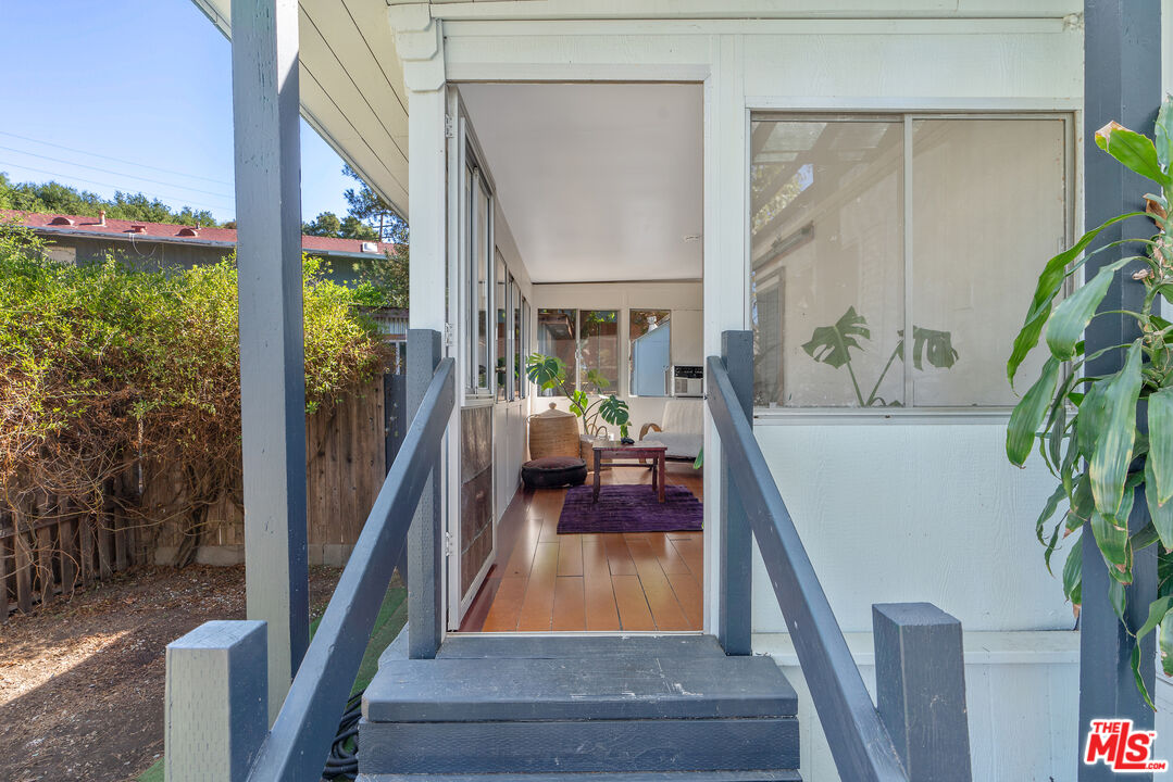 1667 Las Virgenes Canyon Road, Unit 9 Calabasas, CA 91302 - Photo 12 of 29 a living room with furniture