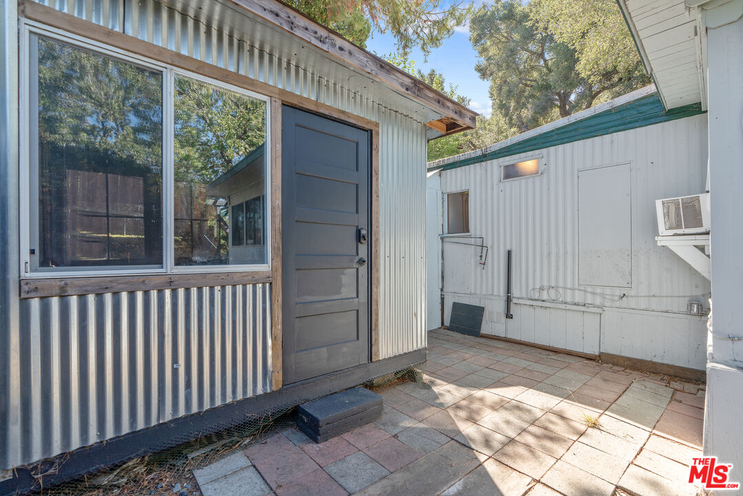 1667 Las Virgenes Canyon Road, Unit 9 Calabasas, CA 91302 - Photo 22 of 29 a view of a back yard from a balcony