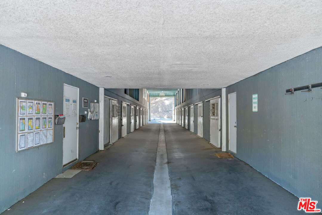 1667 Las Virgenes Canyon Road, Unit 9 Calabasas, CA 91302 - Photo 28 of 29 a view of livingroom with hardwood floor and hallway