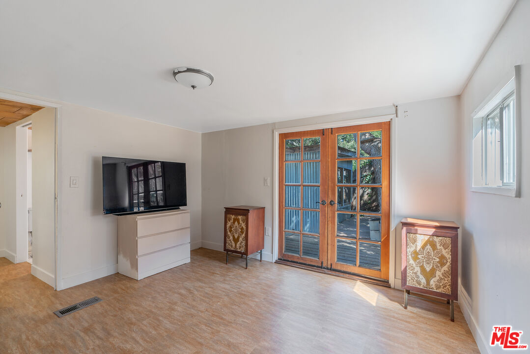 1667 Las Virgenes Canyon Road, Unit 9 Calabasas, CA 91302 - Photo 9 of 29 a view of livingroom with furniture and flat screen tv