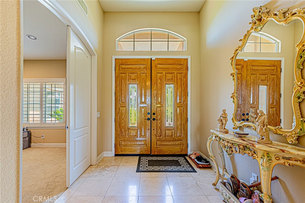 4088 Shady Ridge Circle Corona, CA 92881 - Photo 19 of 47 a view of front door with a livingroom view