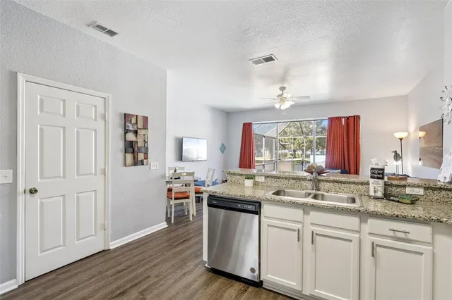 a view of a hallway with washer and dryer