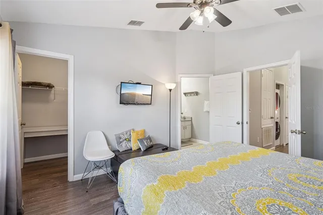 a view of a livingroom with furniture and wooden floor