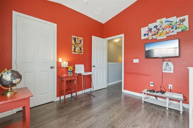 a house view with swimming pool in front of it