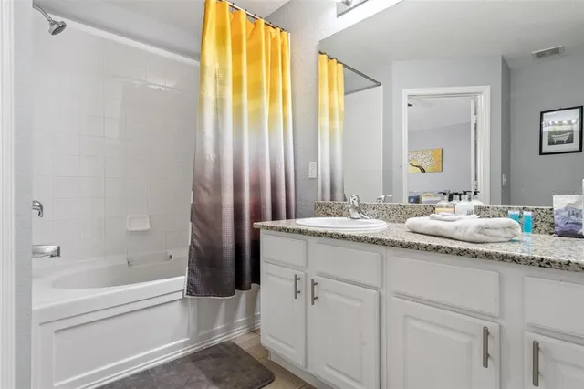 a view of house with outdoor space and garden