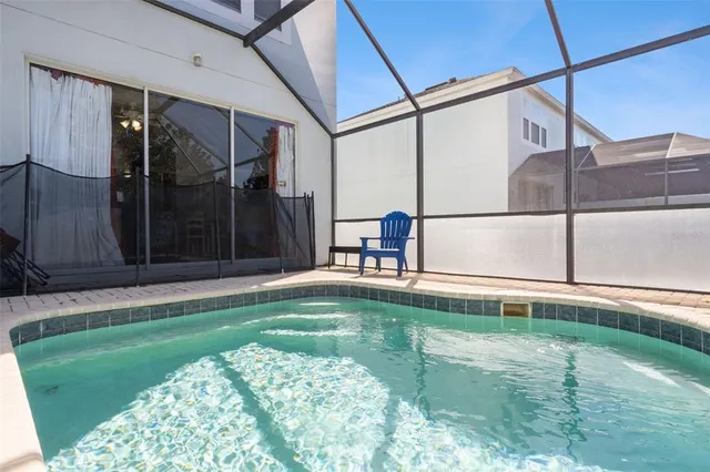 an aerial view of a house with a garden