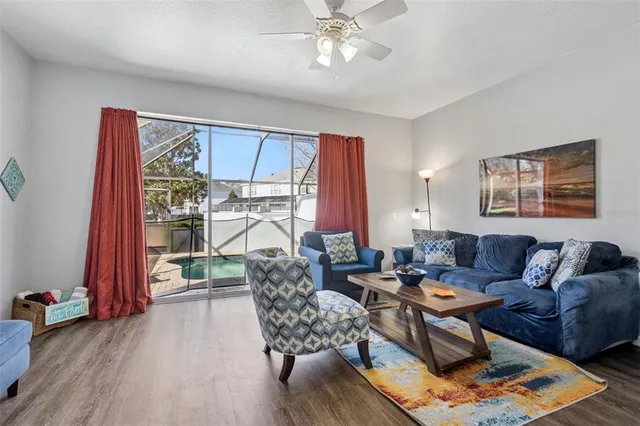 a living room with furniture and a table