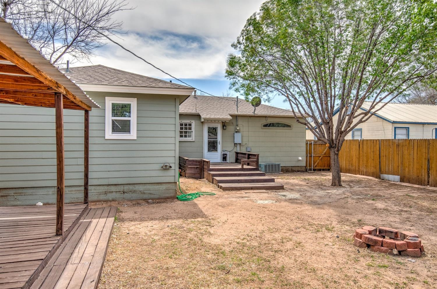 3008 30th Street Lubbock, TX 79410 - Photo 27 of 29 a view of a house with a yard and tree s