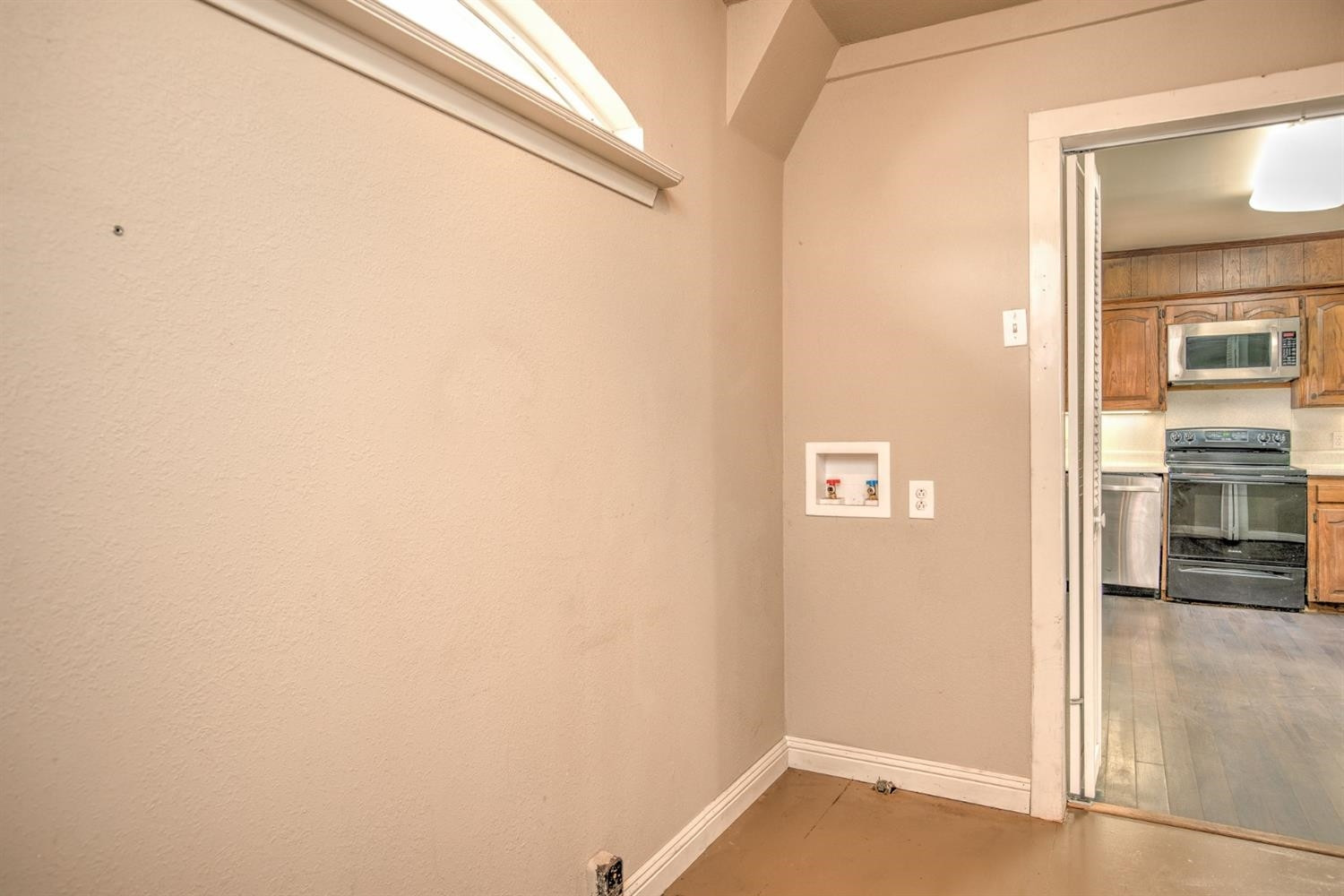 3008 30th Street Lubbock, TX 79410 - Photo 10 of 29 a view of a hallway with a dining table