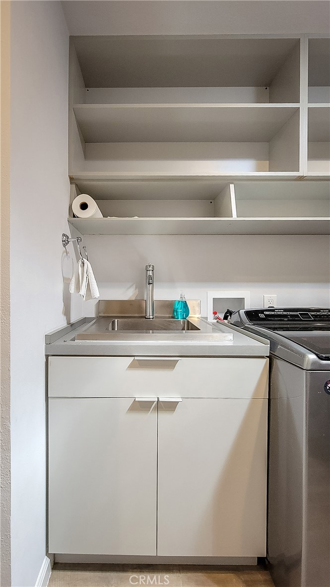 7320 Sherwood Road Joshua Tree, CA 92252 - Photo 20 of 44 a close view of sink and cabinets