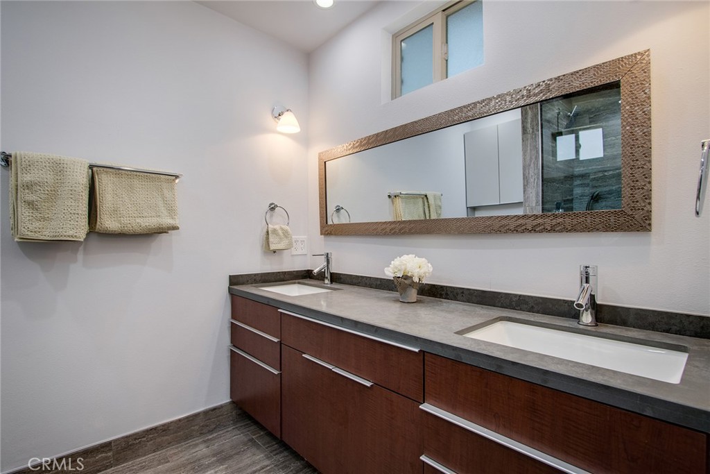 7320 Sherwood Road Joshua Tree, CA 92252 - Photo 27 of 44 a bathroom with a sink and a mirror
