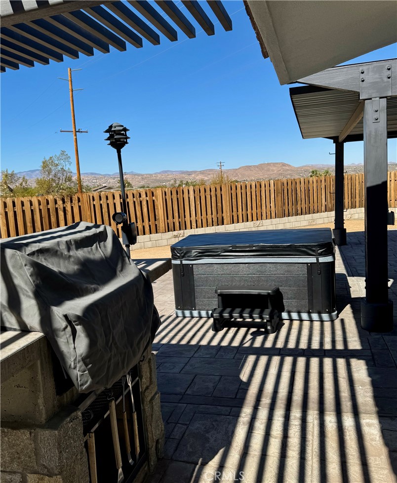 7320 Sherwood Road Joshua Tree, CA 92252 - Photo 42 of 44 a view of balcony with wooden floor