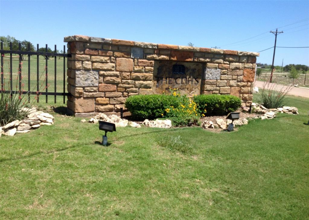 170 Colonial Drive Graford, TX 76449 - Photo 5 of 12 a backyard of a house with lots of green space