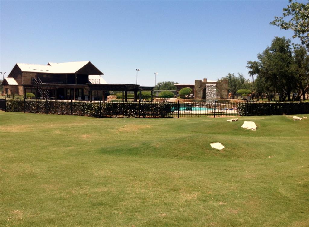 170 Colonial Drive Graford, TX 76449 - Photo 6 of 12 a view of a swimming pool with an ocean view