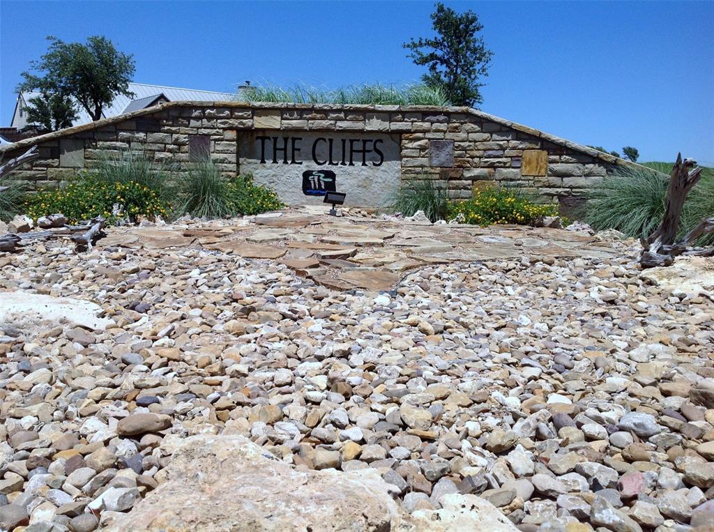 170 Colonial Drive Graford, TX 76449 - Photo 8 of 12 a front view of a house with a yard