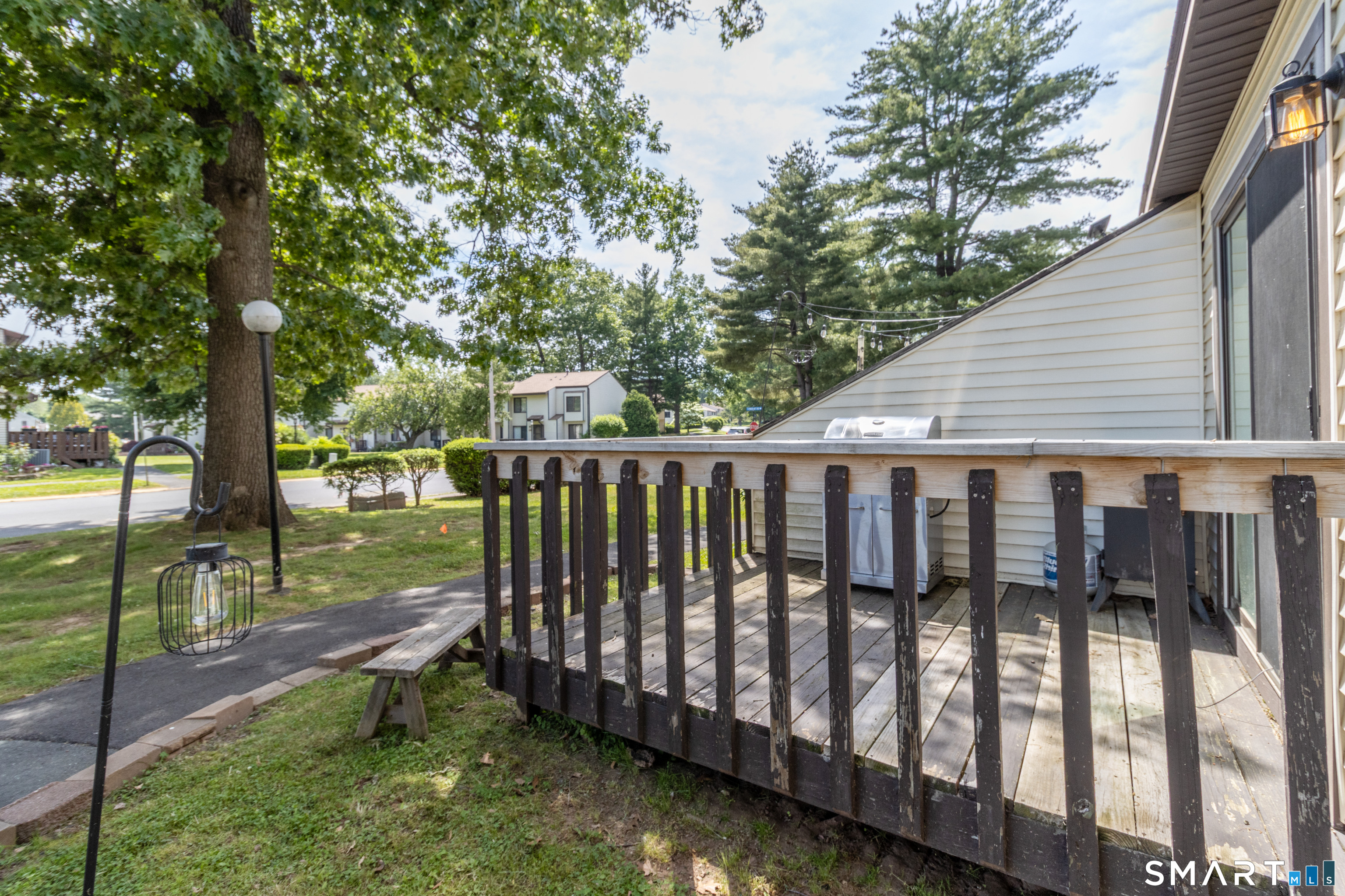 94 Cottonwood Road, Unit 94 Newington, CT 06111 - Photo 29 of 33 Second deck off Living Room facing Cottonwood Road.