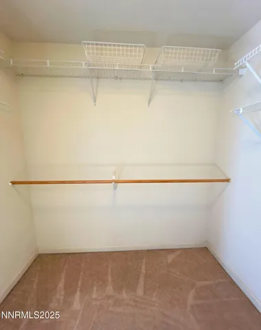 a view of small space with racks on the wall